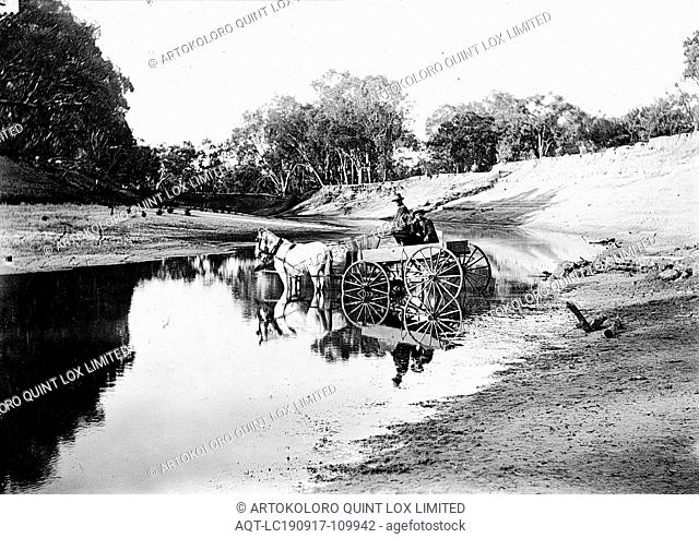 Negative - Wentworth District, New South Wales, circa 1915, Two men fording the Darling River in a horse and carriage. They are on 'Balcatherine' station