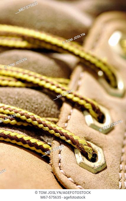 Shoelaces and eyelets of boot, close up.England , UK