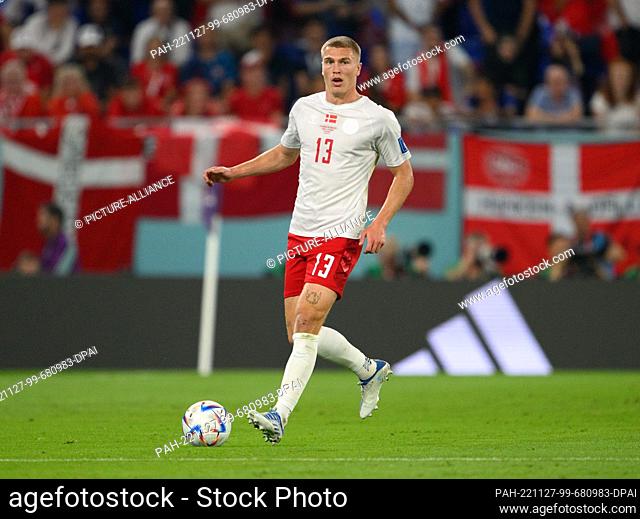 26 November 2022, Qatar, Doha: Soccer: World Cup, France - Denmark, preliminary round, Group D, Matchday 2, Stadium 974, Denmark's Rasmus Kristensen plays the...