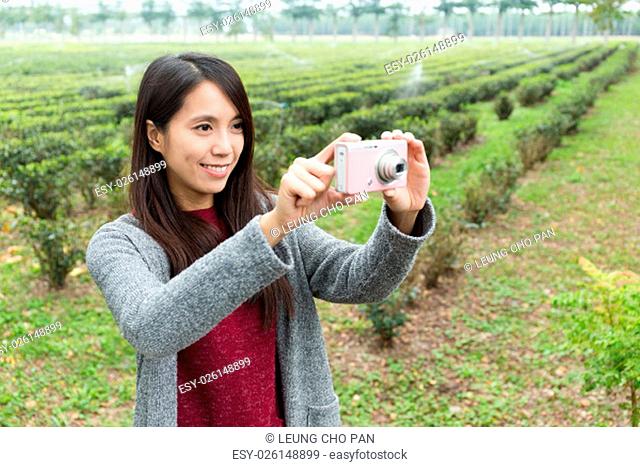 Asian Woman use of the camera