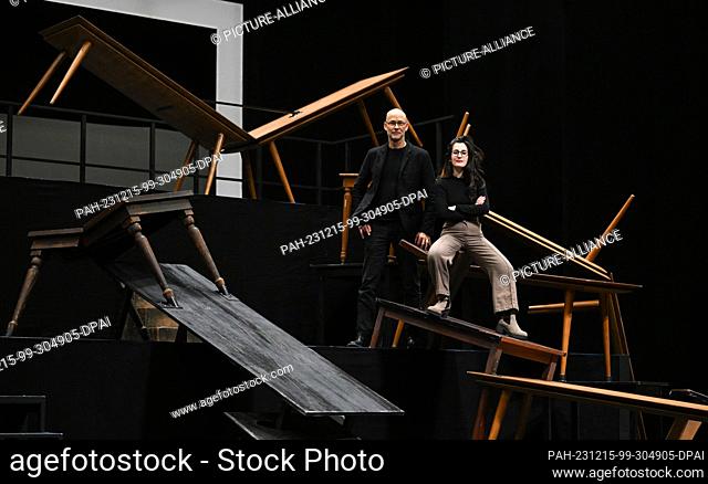 14 December 2023, Saxony, Leipzig: Director Ilaria Lanzino and set designer Dirk Becker sit in the middle of the set design for ""Mary