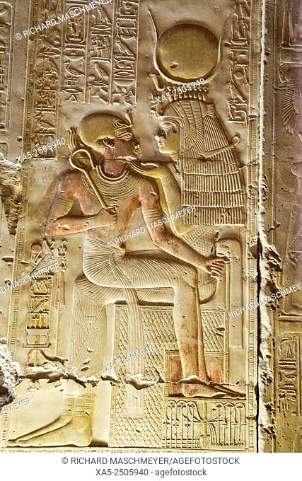 Bas-relief of Pharaoh Seti I (left) and Goddess Isis (right), Temple of Seti I, Abydos, Egypt