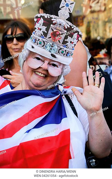 Royal fans from UK and around the world camps on the route of the carriage procession in Windsor as final preparations are underway ahead of the Royal Wedding...