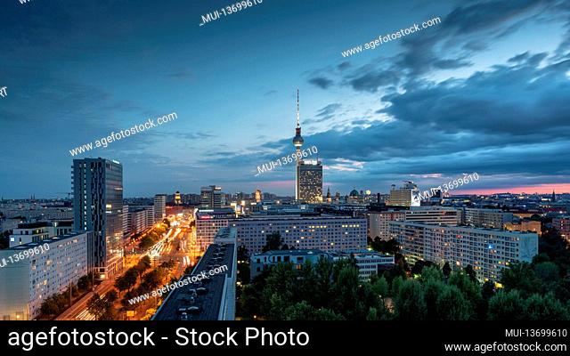 View of the illuminated streets of Berlin with the TV tower and Alexanderplatz at night