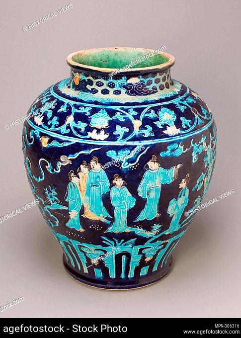 Jar with Scholars in Garden - Ming dynasty (1368'1644), 16th century - China. Fahua ware; stoneware with biscuit outlines and underglaze molded decoration