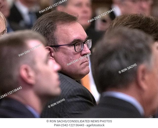 Administrator of the United States Environmental Protection Agency Andrew Wheeler looks on as US President Donald J. Trump makes remarks on “America’s...