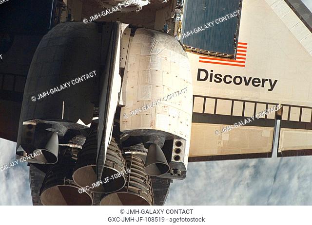 Space Shuttle Discovery's tail section is featured in this close-up image photographed by an Expedition 16 crewmember during a backflip maneuver performed by...