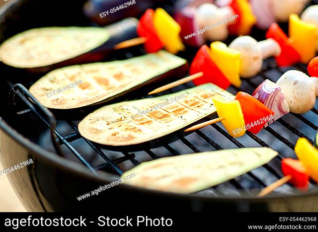vegetables and mushrooms roasting on brazier grill