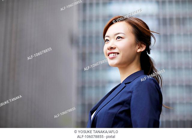 Young Japanese businesswoman downtown