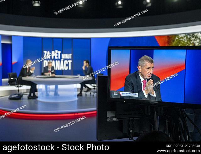 Czech Prime Minister Petr Fiala (ODS), centre, and former PM Andrej Babis (ANO), left, attend a discussion programme on Nova TV, Five Minutes to Twelve