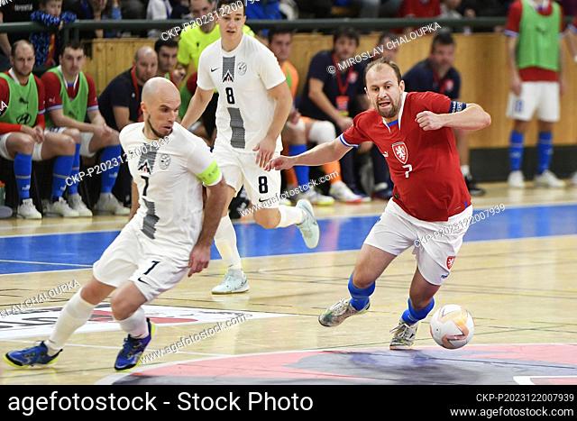 Igor Osredkar (SLO), left, and Lukas Resetar (CZE), right, in action during the final match of Group D of the 2024 FIFA Futsal World Cup qualification