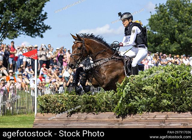 Ingrid KLIMKE (GER) on EQUISTROs Siena just do it, jumping, in the water, action, 28th place in eventing, cross-country C1C: SAP-Cup, on July 2nd, 2022