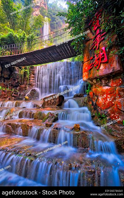 Zhangjiajie, China - August 2019 : Stunning waterfall at Baofeng lake, Wullingyuan in Zhangjiajie region