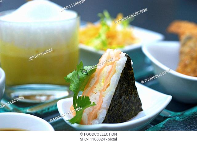 A sushi triangle with salmon