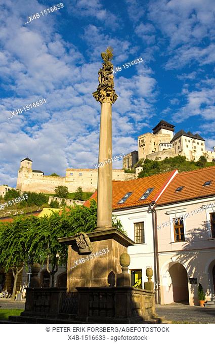 Mierove namestie square with Plague Column and the castle Trencín city Slovakia Europe