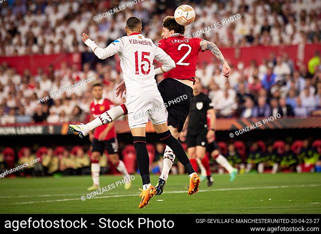 Seville, Spain. 20th, April 2023. Youssef En-Nesyri (15) of Sevilla FC and Victor Lindelof (2) of Manchester United seen during the UEFA Europa League match...