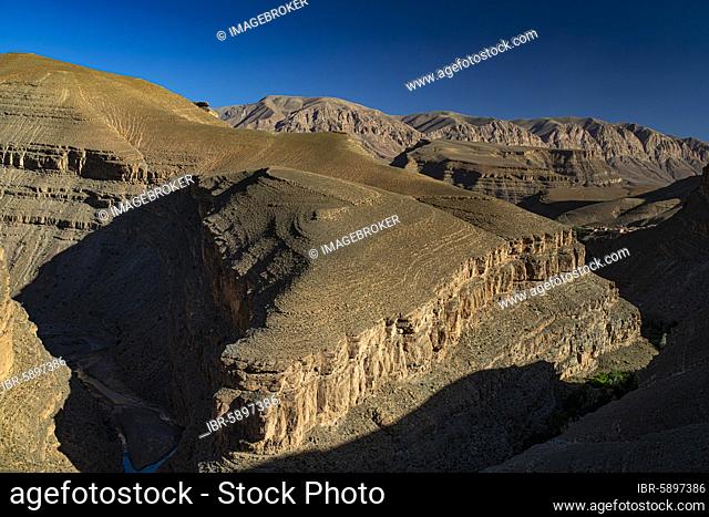 View of canon-like erosion landscapes in the upper Dade Valley near Msemrir, High Atlas, Southern Morocco, Morocco, Africa