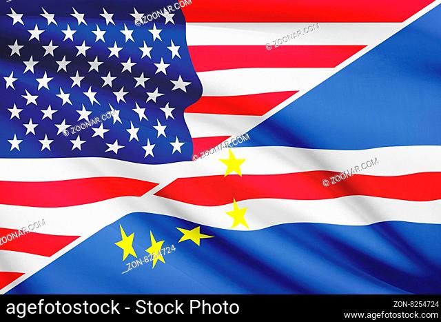 Flags of USA and Cape Verde blowing in the wind. Part of a series