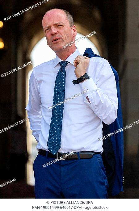 12 June 2019, Saxony, Dresden: Matthias Haß (CDU), Minister of Finance of Saxony, can be seen in the Dresden Zwinger during a tour together with the state-owned...