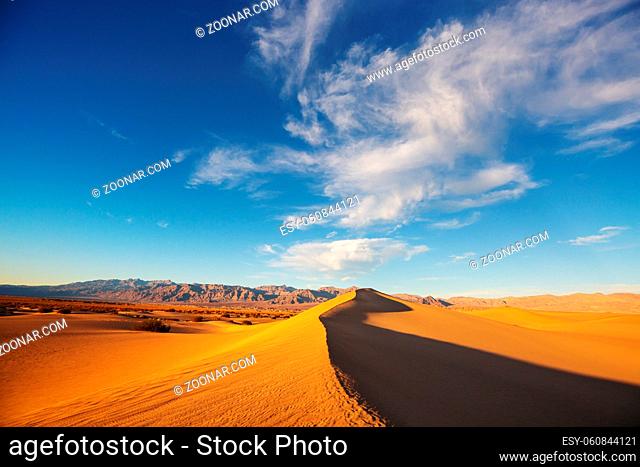 Sand dunes in Death Valley National Park, California, USA. Living coral toned