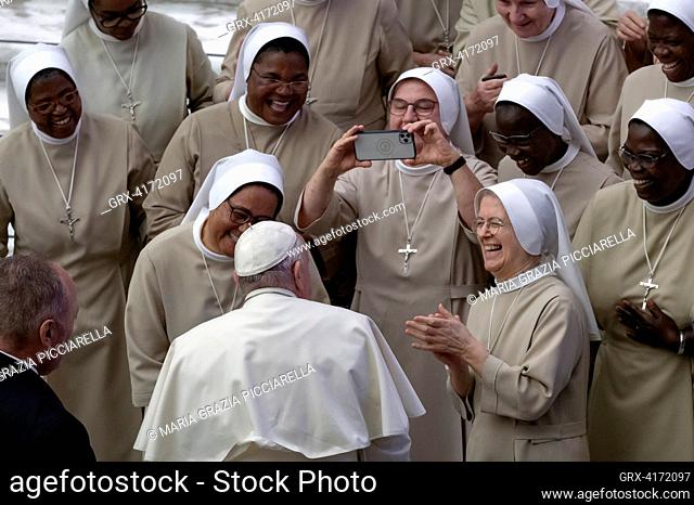 Vatican City, Vatican, 30 august 2023. Pope Francis greets a group of nuns during his weekly general audience in the Paul Vi Hall