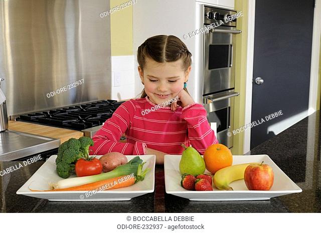 Little girl fruits vegetables