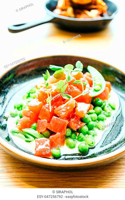 Raw and fresh tuna meat tartare with vegetable - Color filter Processing
