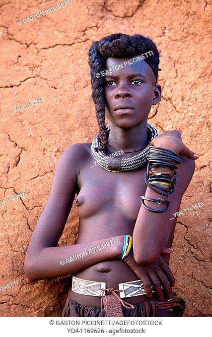 Himba girl, with the typical double plait hairstyle, Damaraland region, Namibia