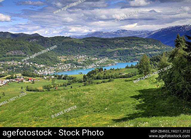 View of the mountains surrounding the village of Oystese located on Hardangerfjord fjord, Hordaland region of Norway, Scandinavia, Europe