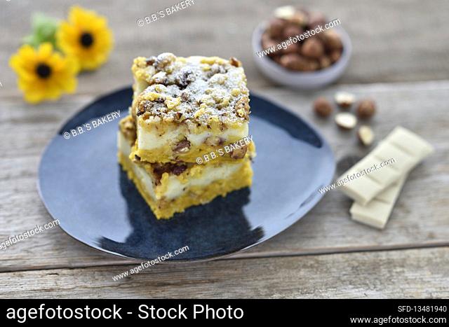 Vegan pumpkin cheese cake with white chocolate and caramelized hazelnut sprinkles