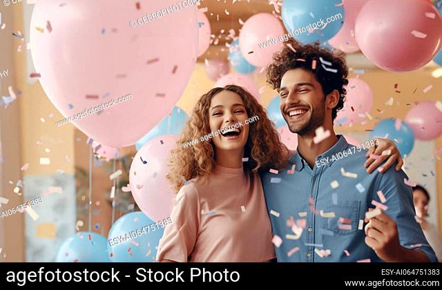 Expectant parents are having a gender reveal party. Blue and pink balloons and pink confetti. Family, pregnancy and holiday concept
