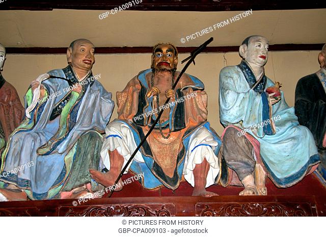 China: Some of sculptor Li Guangxiu's unusual arhat statues, Qiongzhu Si (Bamboo Temple), northwest of Kunming