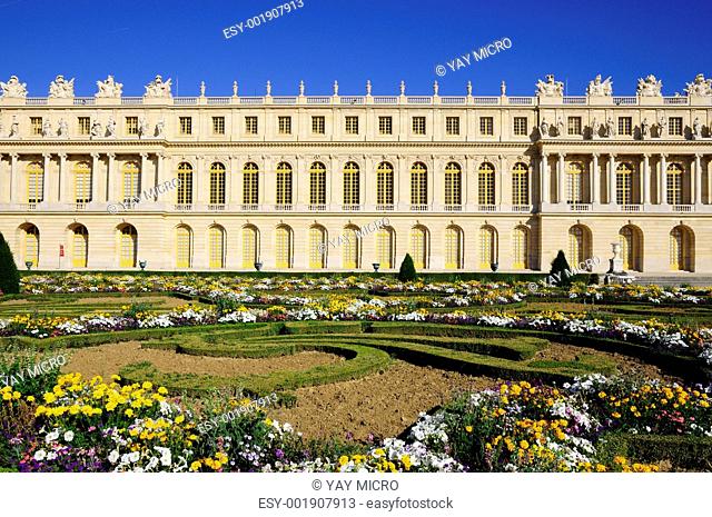 classic palace building and garden in versailles Paris