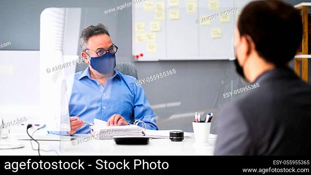 Business Tax Consultant Or Advisor Meeting With Face Mask