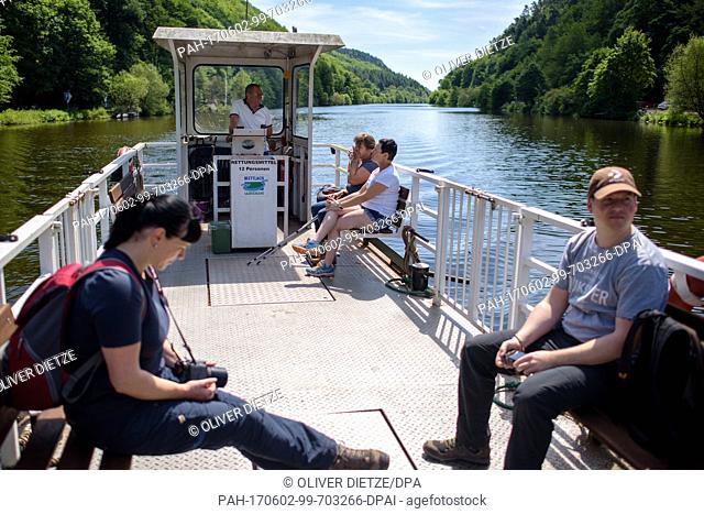 Matthias Mann crosses the Saar river with the Mettlach ferry in Dreisbach, Germany, 25 May 2017. Mann steers the last operating ferry on the Saar river