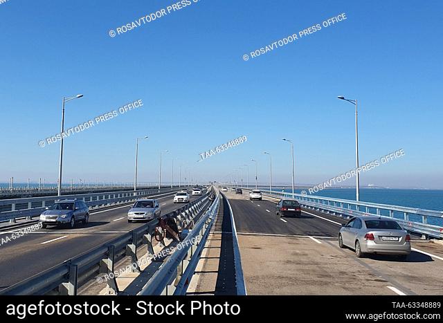 RUSSIA, REPUBLIC OF CRIMEA - OCTOBER 14, 2023: Vehicles are seen on the Crimean Bridge across the Kerch Strait after four lanes re-opened for traffic following...