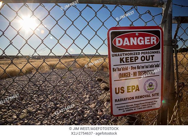 Mariano Lake, New Mexico - A sign warns of radiation danger on the site of an abandoned uranium mine, one of more than 500 abandoned mines on Navajo Nation land