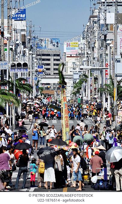 Naha, Okinawa, Japan, people at the 10 000 Taiko Eisa dance parade along Kokusai-dori, August