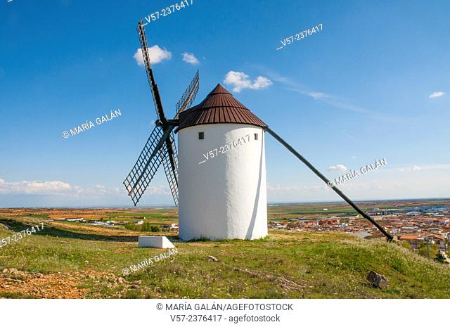 Windmill and village. Mota del Cuervo, Cuenca province, Castilla La Mancha, Spain