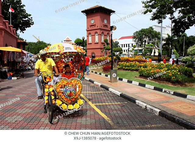 A rickshaw by the Christ Church, Malacca, Malaysia