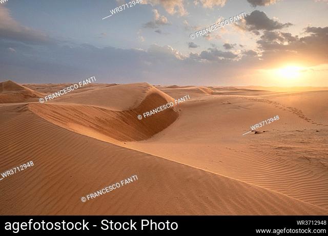Sand dunes at sunset in the Wahiba Sands desert, Oman, Middle East