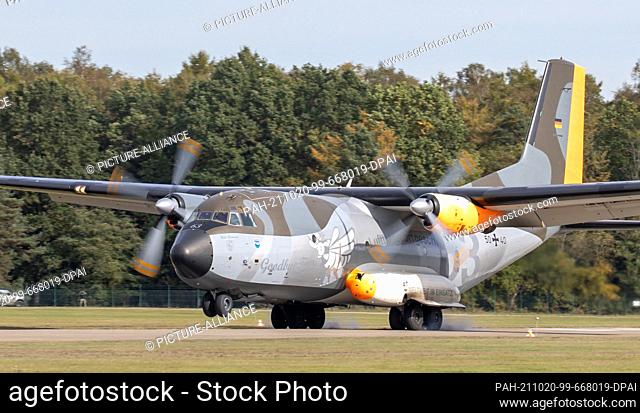 20 October 2021, Bavaria, Roth: A C-160 Transall with a special livery lands on the runway of the Otto Lilienthal barracks