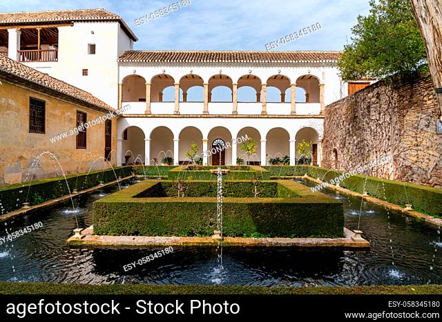 Granada, Spain - 5 February, 2021: the Patio de los Cipreses in the Generalife Palace in the Alhambra in Granada