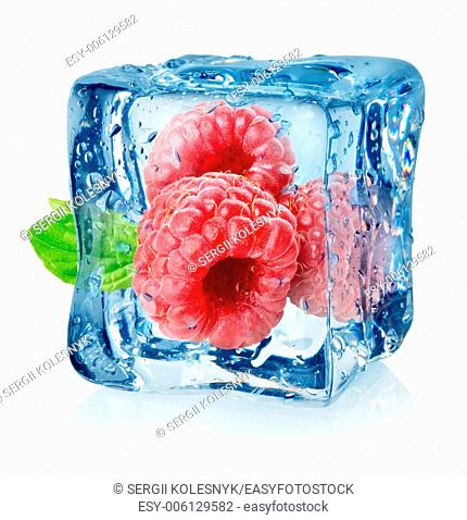 Ice cube and raspberries isolated on a white background