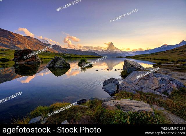 Scenic view of Stellisee lake with Matterhorn mountain at sunset, Zermatt, Switzerland