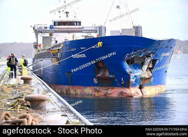 29 March 2022, Schleswig-Holstein, Kiel: The heavily bow-damaged ""Bjoerkoe"" lies on the quay of a building materials store