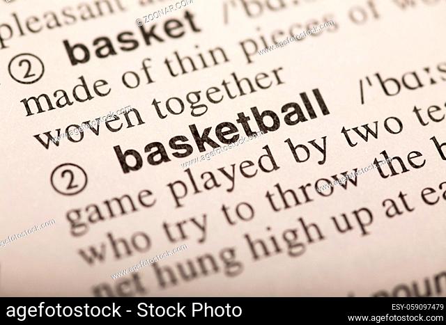 basketball - word in dictionary. macro shot. selective focus