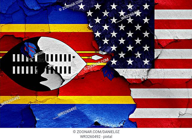 flags of Swaziland and USA painted on cracked wall