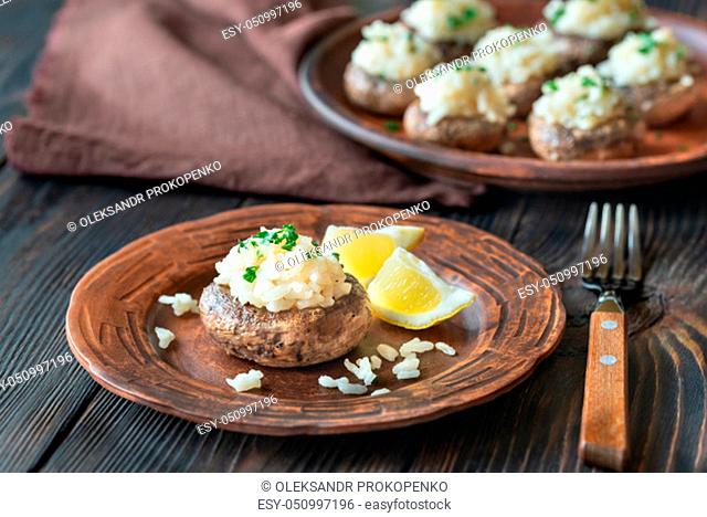 Baked mushrooms stuffed with risotto