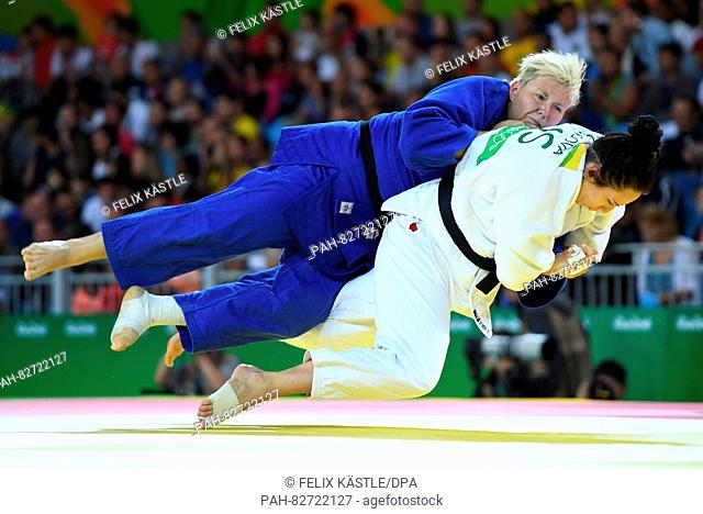 Jasmin Kuelbs of Germany (blue) in action against Ksenia Chibisova of Russia during the Women +78 kg Elimination Round of 32 of the Judo events during the Rio...